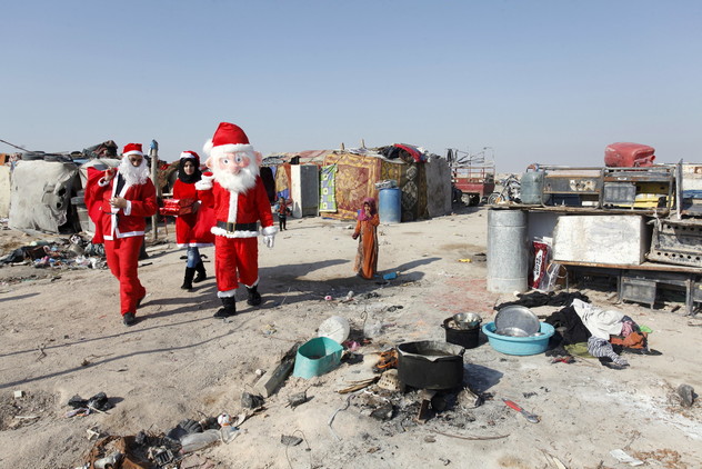 بابانوئل خود را به عراق رساند+ تصاویر